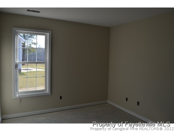 9628 Lukes Run Road Linden, NC 28356 - Photo 19 of 25 a view of an empty room and window
