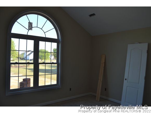 9628 Lukes Run Road Linden, NC 28356 - Photo 21 of 25 a view of an entryway with a window