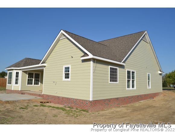 9628 Lukes Run Road Linden, NC 28356 - Photo 24 of 25 a view of house with backyard