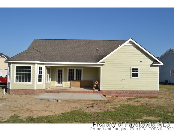 9628 Lukes Run Road Linden, NC 28356 - Photo 25 of 25 a view of a house with a backyard