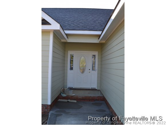 9628 Lukes Run Road Linden, NC 28356 - Photo 4 of 25 a picture of a door of the house
