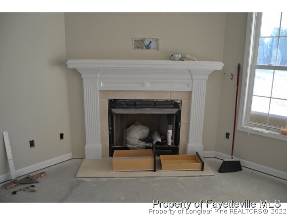 9628 Lukes Run Road Linden, NC 28356 - Photo 8 of 25 a living room with a fireplace
