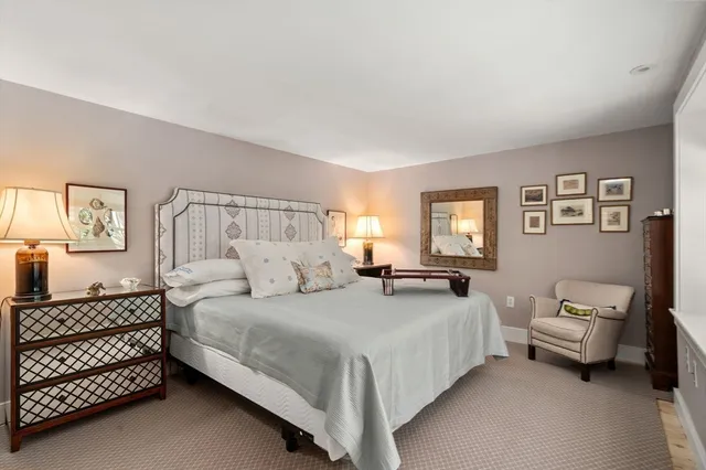 a bathroom with a granite countertop sink mirror and double