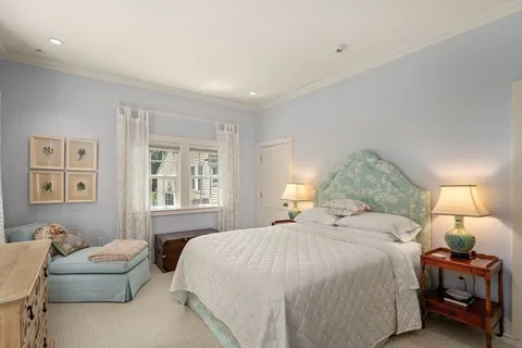 a room with furniture and a projector screen