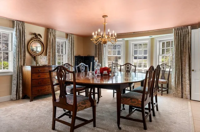 a kitchen with granite countertop a stove top oven sink and cabinets