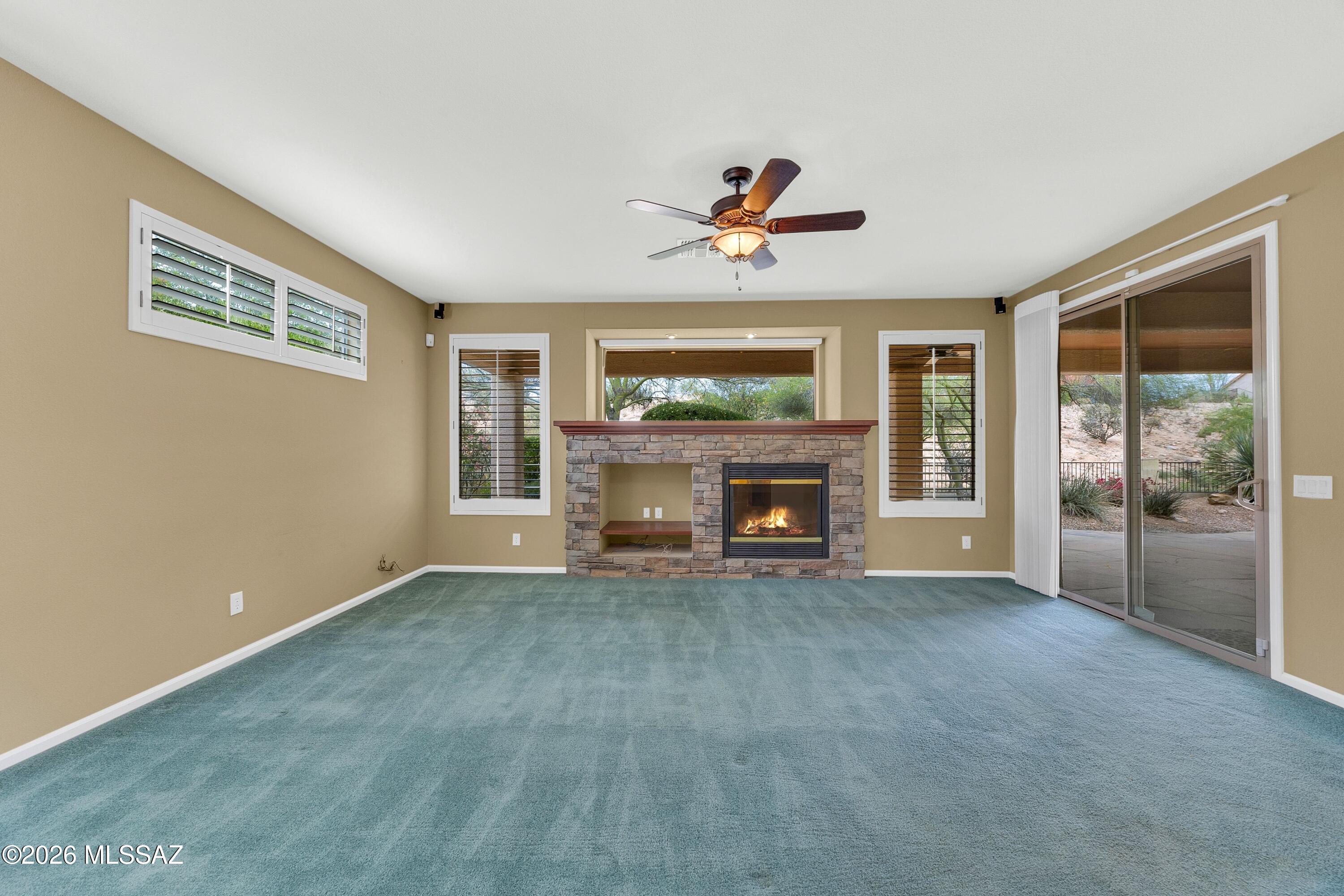 62090 East Northwood Road Tucson, AZ 85739 - Photo 19 of 49 Stacked Stone Media Center/Gas Fireplace
