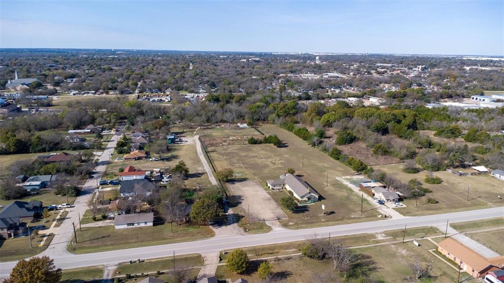 20 South Lancaster Hutchins Road Lancaster, TX 75146 - Photo 12 of 14 Expansive property featuring undeveloped land with surrounding residences and commercial structures