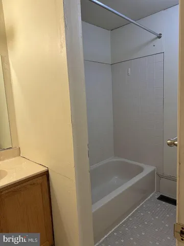 a bathroom with a bathtub