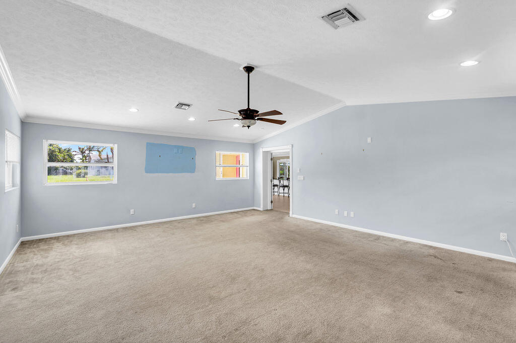 614 Southeast Flamingo Avenue Stuart, FL 34996 - Photo 25 of 49 a view of an empty room with a window