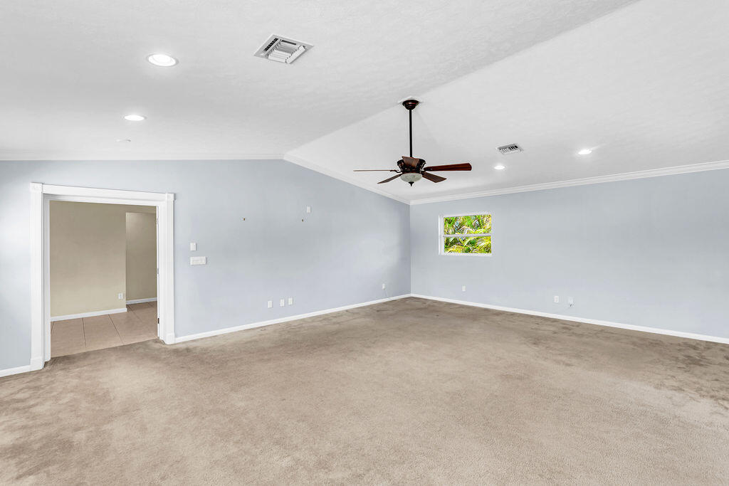 614 Southeast Flamingo Avenue Stuart, FL 34996 - Photo 26 of 49 a view of an empty room with a window