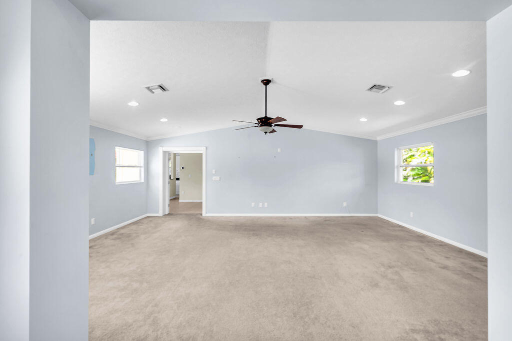 614 Southeast Flamingo Avenue Stuart, FL 34996 - Photo 27 of 49 an empty room with windows and closet