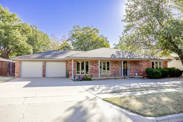 front view of a house with a patio