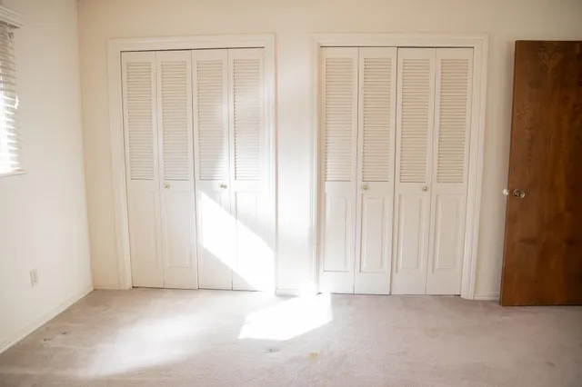 an empty room with windows