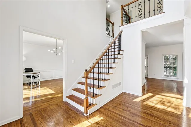 a view of a living room and entry way