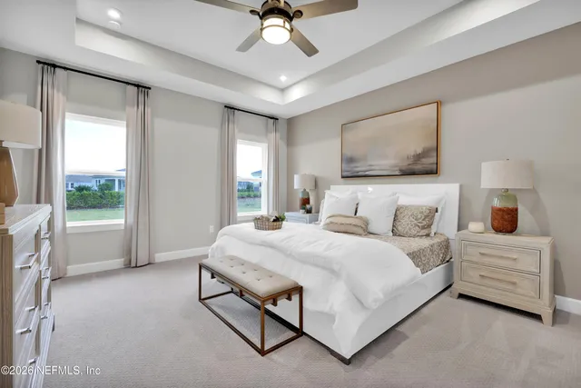 a bathroom with a double vanity sink and mirror