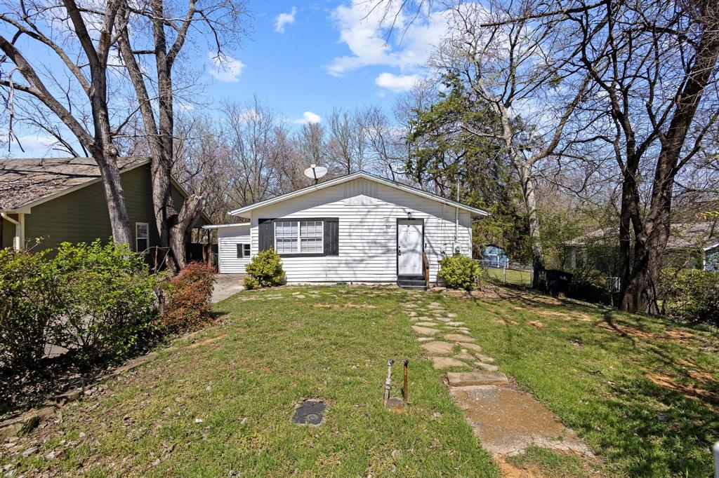a view of house with outdoor space