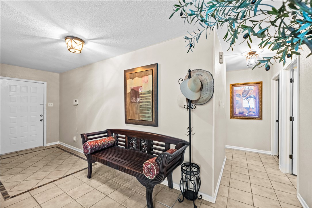 5213 Inverness Drive Corpus Christi, TX 78413 - Photo 3 of 23 a view of a hallway with seating area