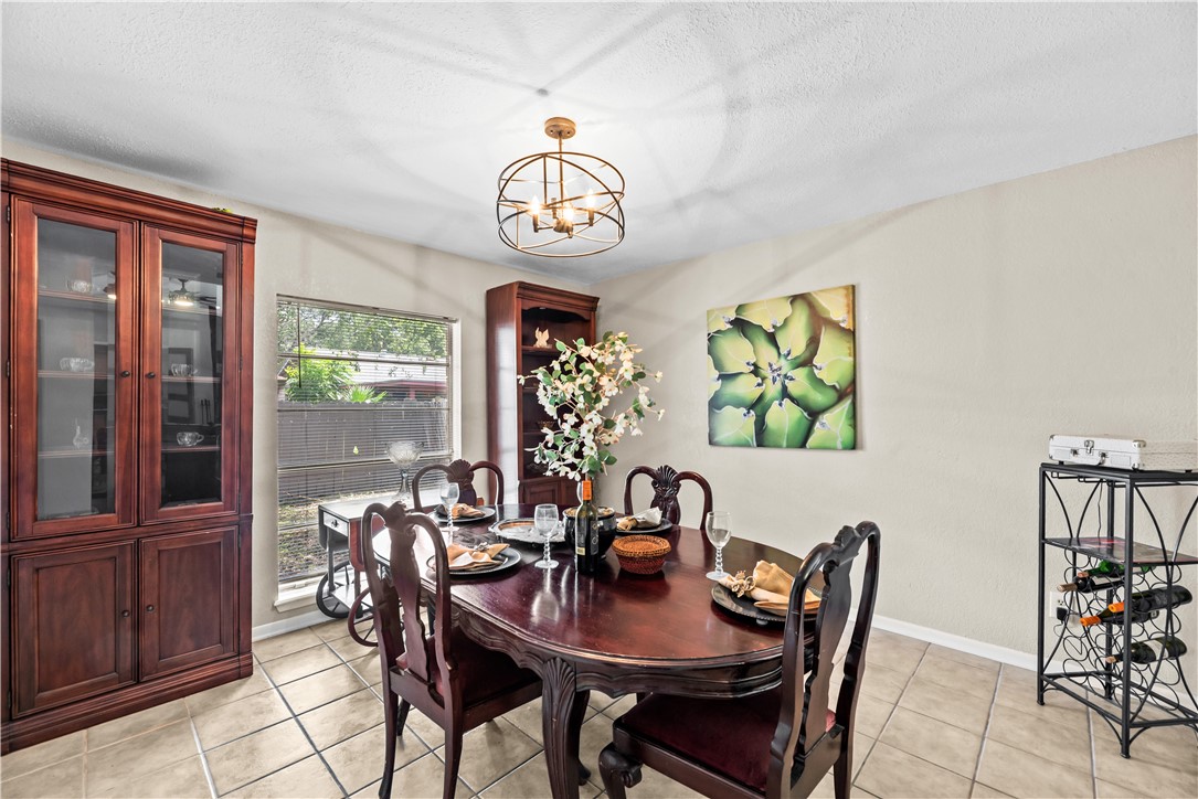 5213 Inverness Drive Corpus Christi, TX 78413 - Photo 7 of 23 a view of a dining room with furniture window and outside view