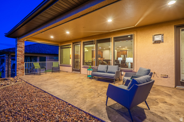 2212 Chippenham Court St. George, UT 84770 - Photo 26 of 75 Patio at night featuring a patio and an outdoor hangout area