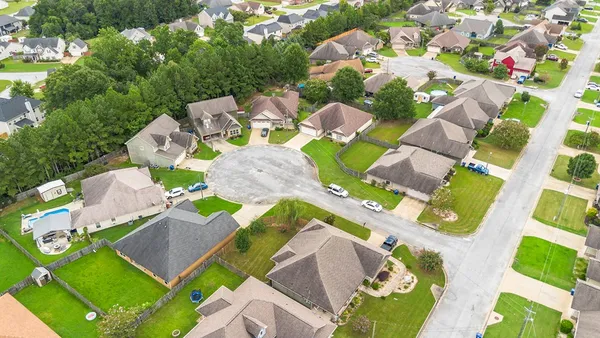 a view of yard and swimming pool