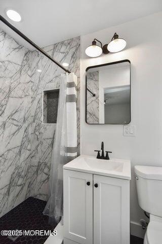 7 Kaylen Place Hazlet, NJ 07730 - Photo 20 of 22 a bathroom with a sink vanity and a mirror