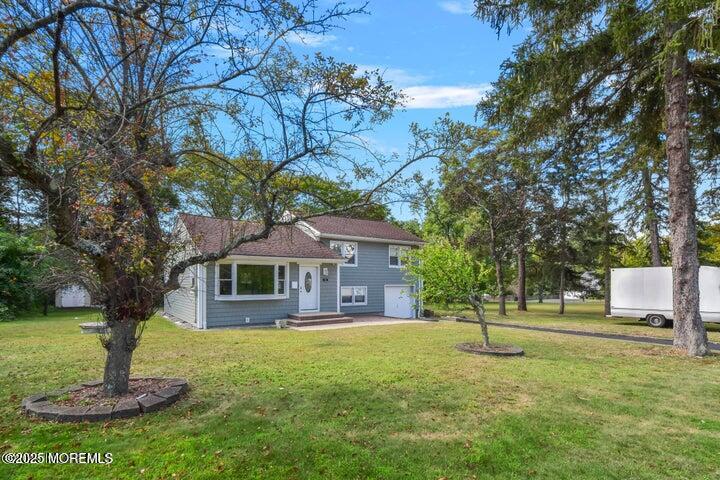 7 Kaylen Place Hazlet, NJ 07730 - Photo 8 of 22 a front view of a house with a yard