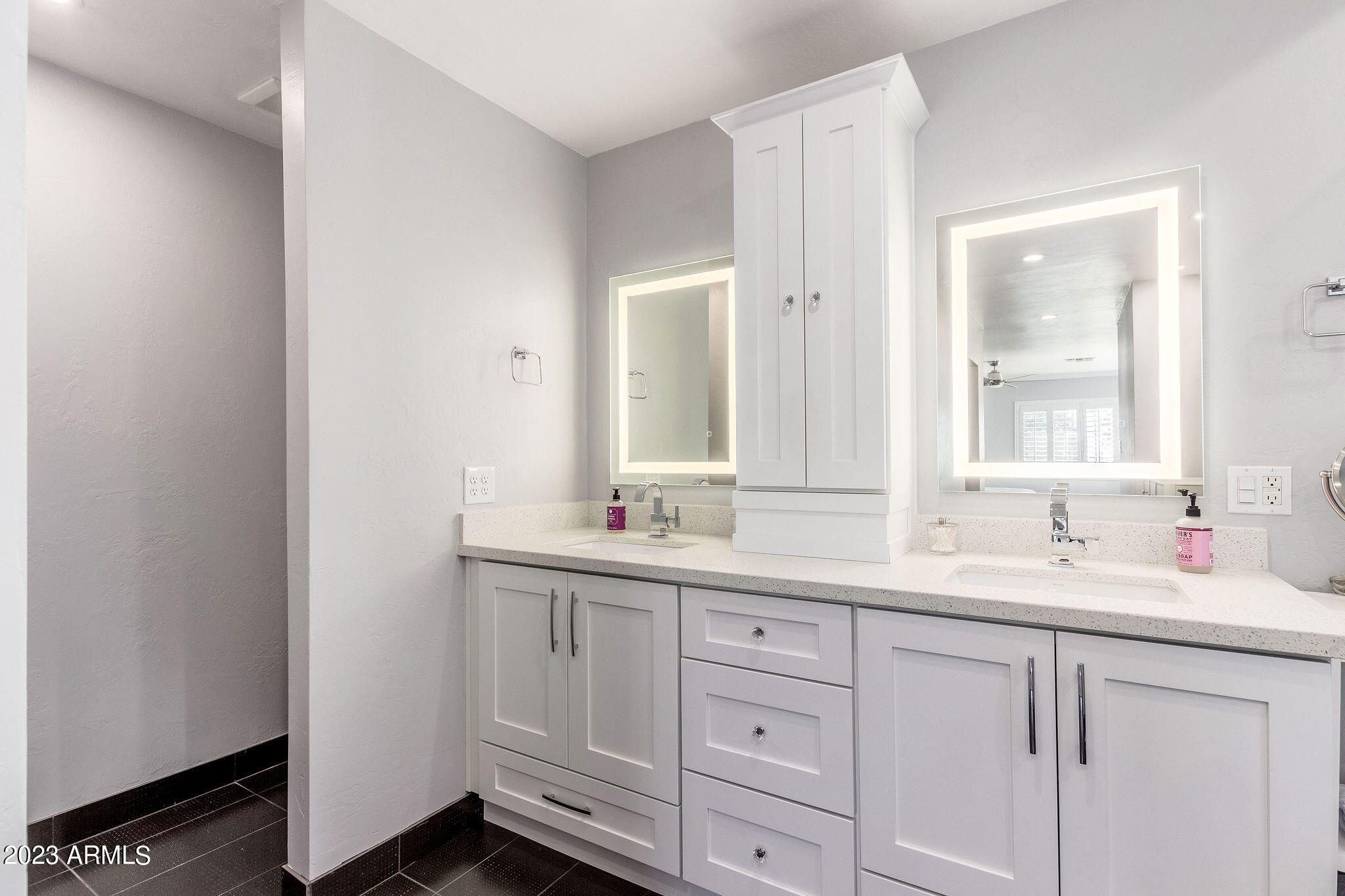 5822 North Scottsdale Road Paradise Valley, AZ 85253 - Photo 15 of 31 a bathroom with a sink and a mirror