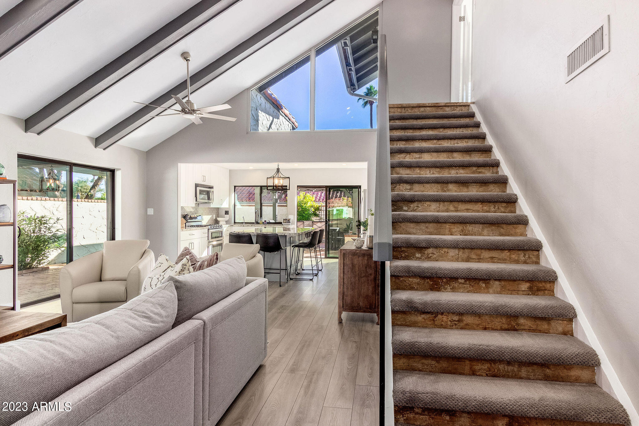 5822 North Scottsdale Road Paradise Valley, AZ 85253 - Photo 9 of 31 a living room with furniture and wooden floor