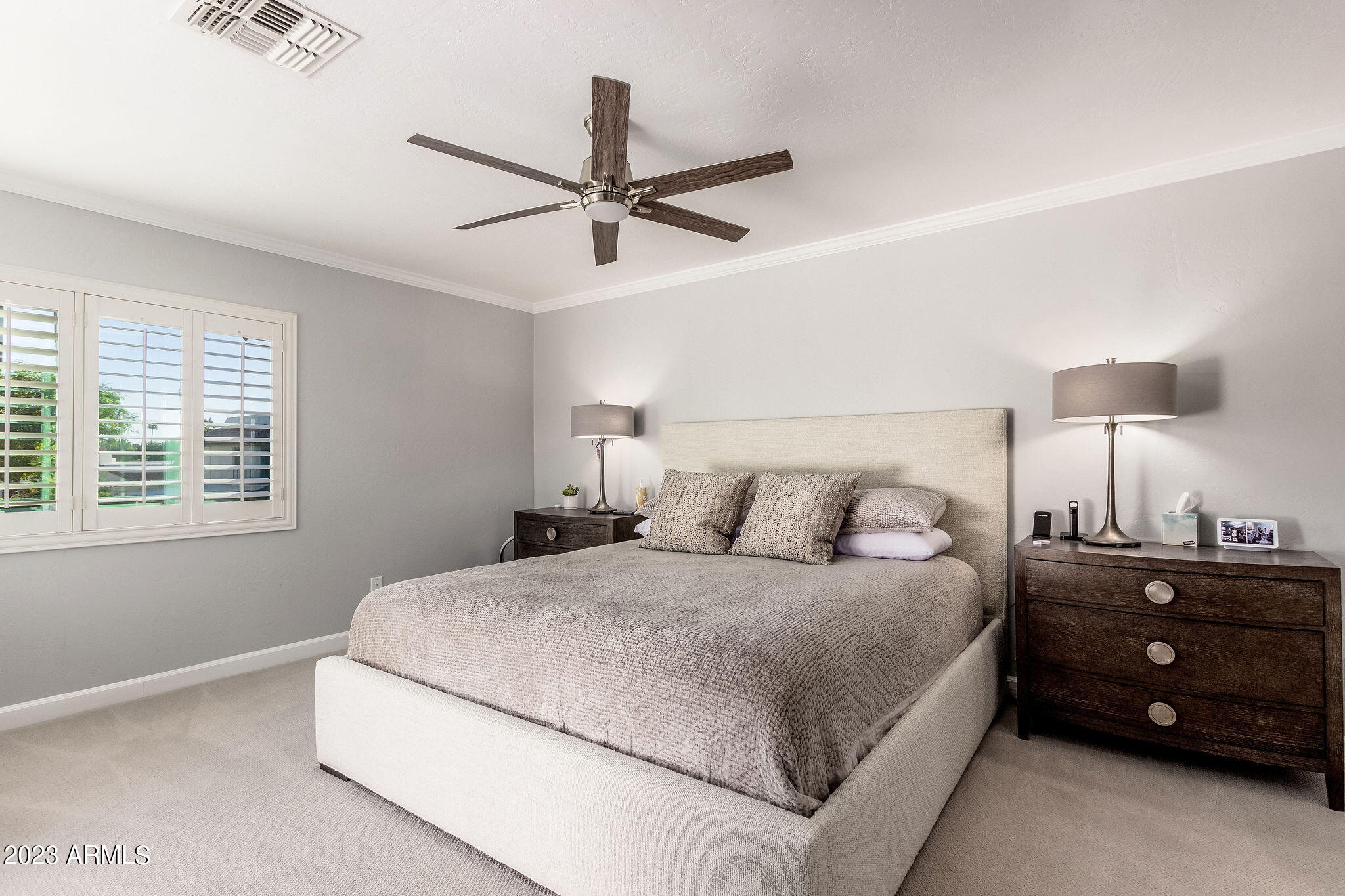 5822 North Scottsdale Road Paradise Valley, AZ 85253 - Photo 10 of 31 a bedroom with a bed and a night stand