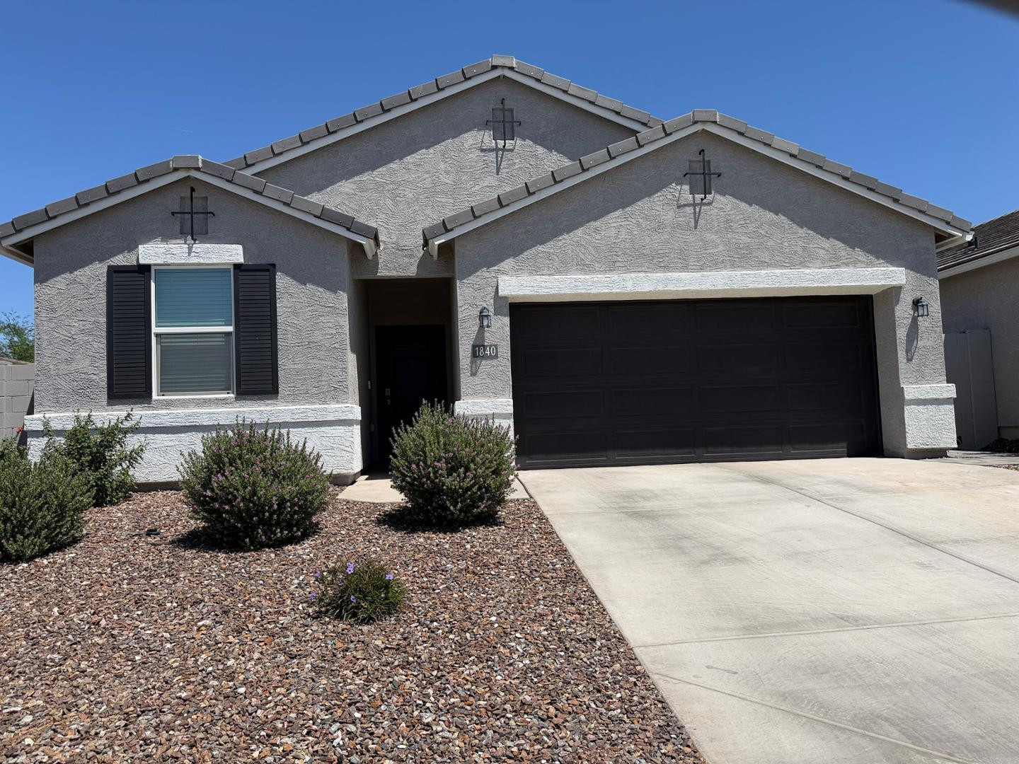 1840 West Spaulding Avenue Apache Junction, AZ 85120 - Photo 1 of 53 a front view of a house with a yard