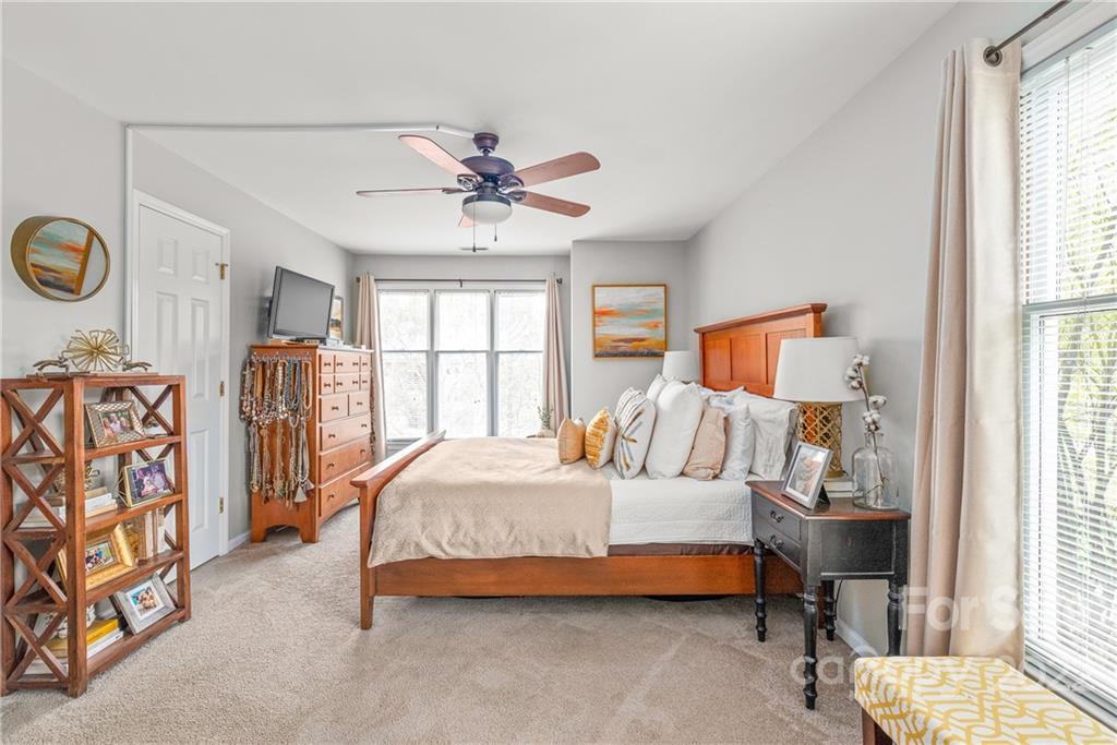 318 Queens Road, Unit 2 Charlotte, NC 28204 - Photo 11 of 18 a bedroom with a bed couch and window