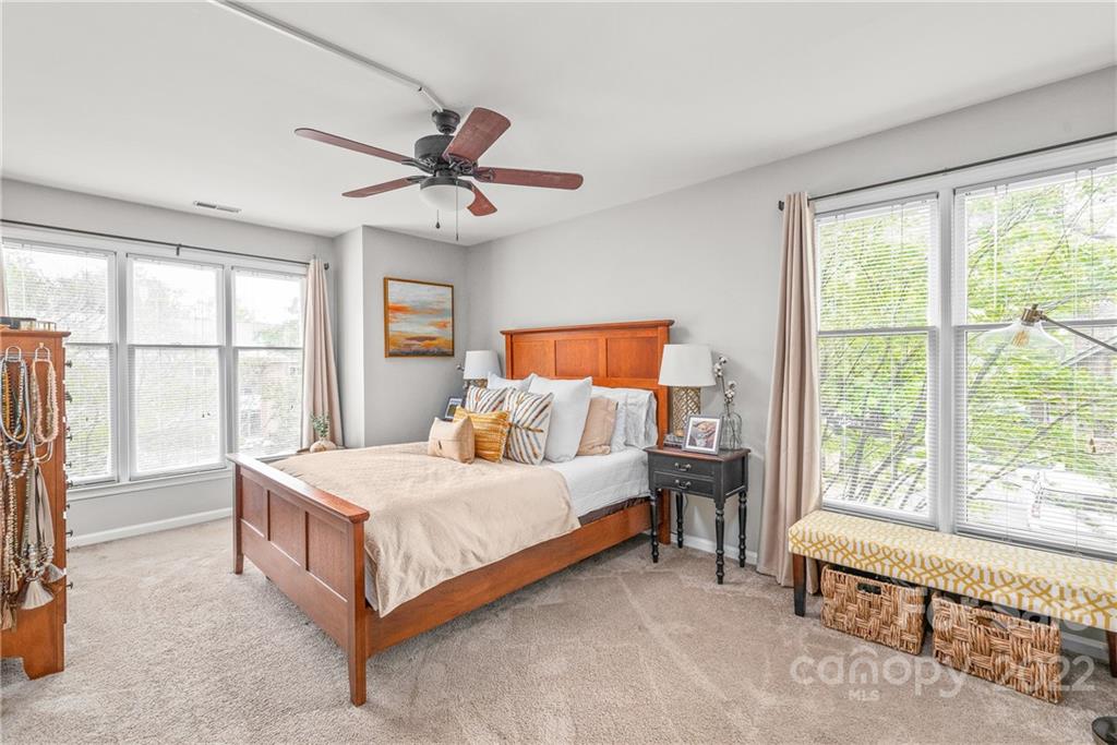318 Queens Road, Unit 2 Charlotte, NC 28204 - Photo 10 of 18 a bedroom with a bed and a large window