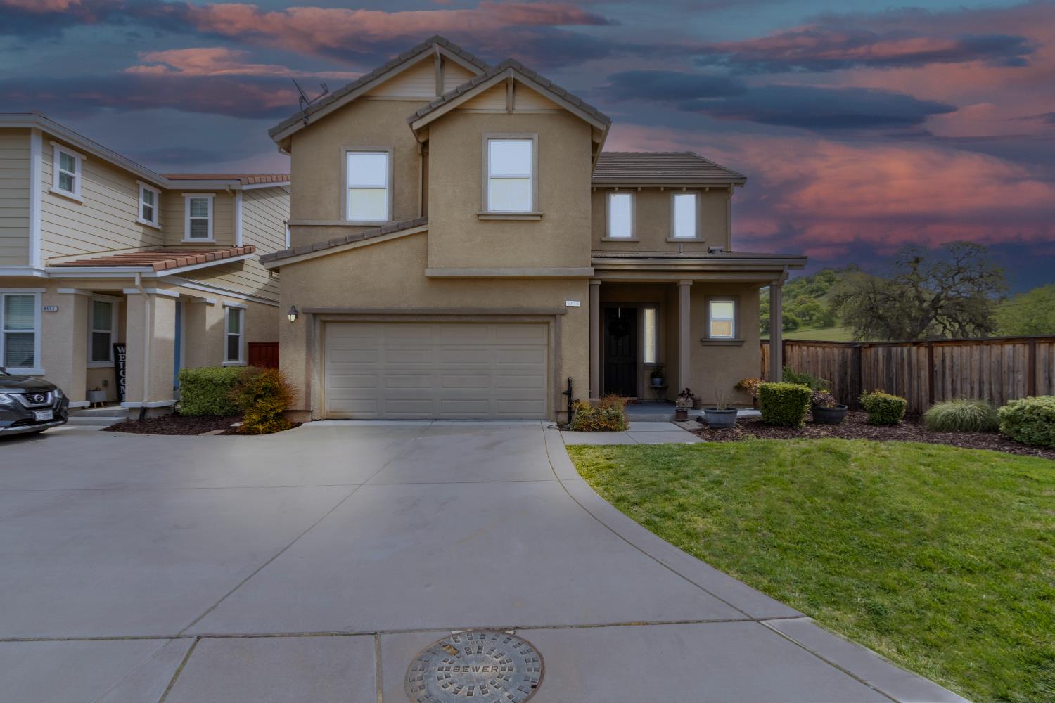 9419 Vintner Circle Patterson, CA 95363 - Photo 1 of 34 a front view of house with yard and outdoor seating