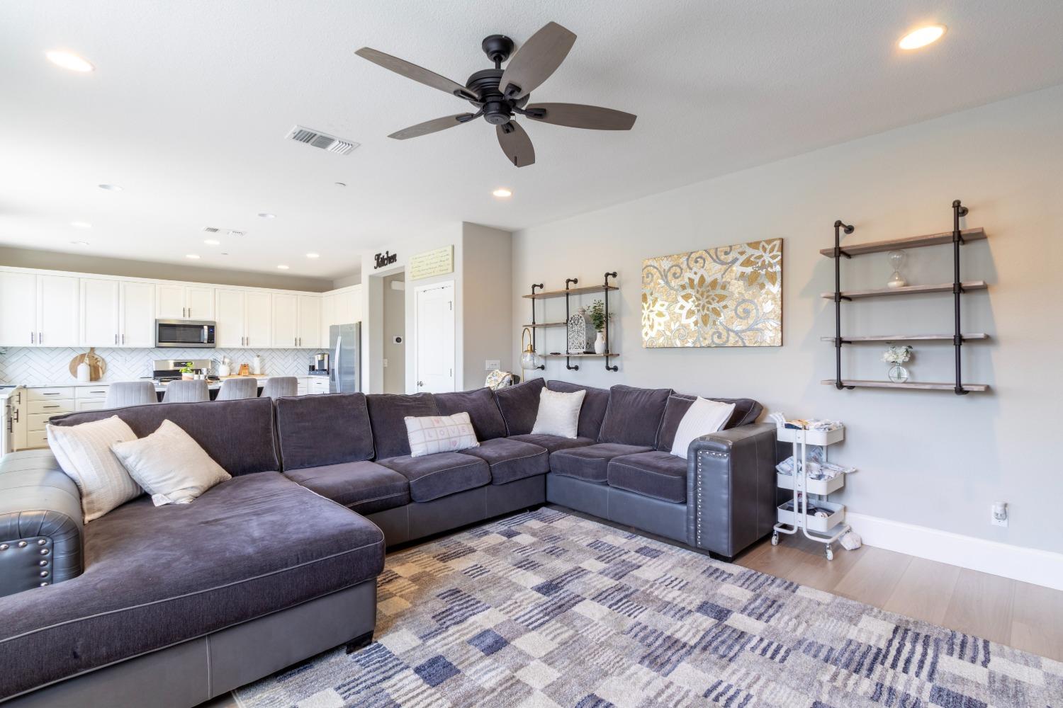 9419 Vintner Circle Patterson, CA 95363 - Photo 13 of 34 a living room with furniture