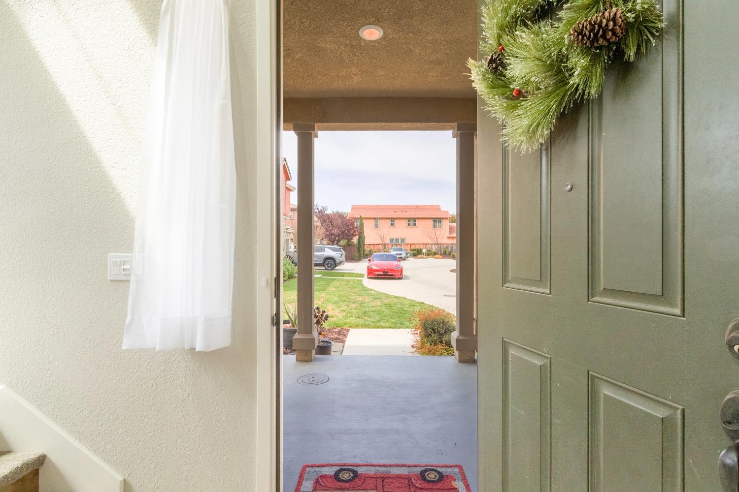 9419 Vintner Circle Patterson, CA 95363 - Photo 7 of 34 a view of a porch with furniture