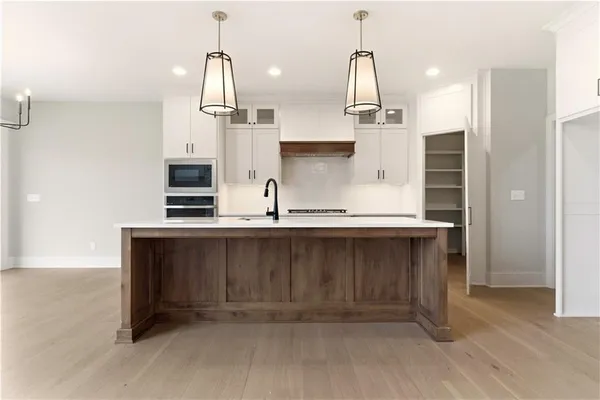 $927,445 | 2531 Northeast Woodland Court, Lee's Summit, MO 64086