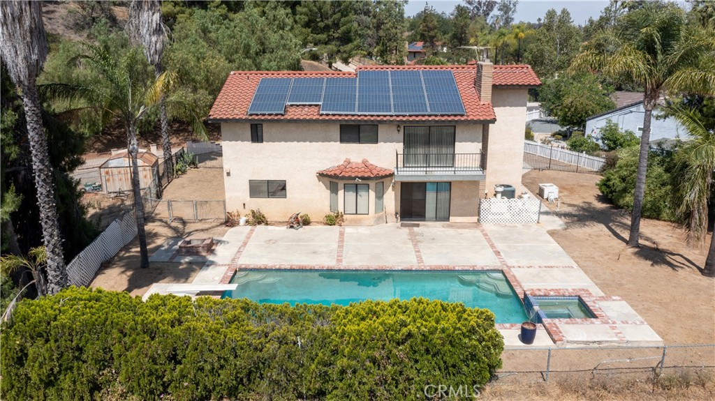 17656 Mockingbird Hill Circle Riverside, CA 92504 - Photo 45 of 49 a front view of a house with garden