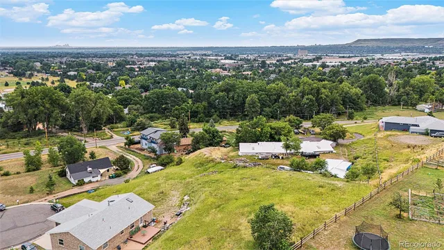 a view of a lake with a yard