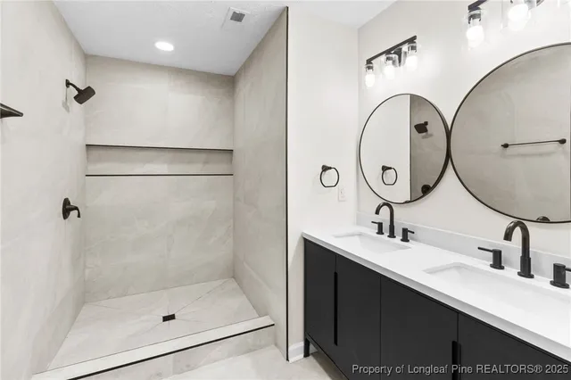 a bathroom with a shower and toilet