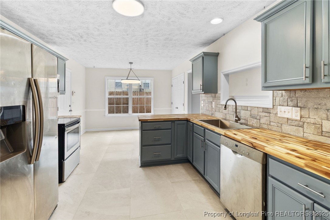 5520 Rising Ridge Drive Hope Mills, NC 28348 - Photo 6 of 30 a large kitchen with a large window