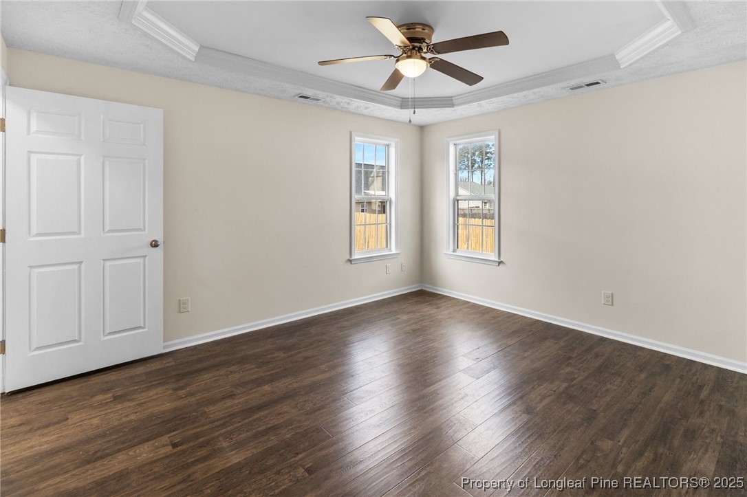 5520 Rising Ridge Drive Hope Mills, NC 28348 - Photo 10 of 30 a view of empty room with wooden floor and fan