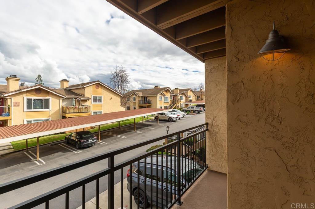 505 San Pasqual Valley Road, Unit 186 Escondido, CA 92025 - Photo 24 of 28 a view of a street from a balcony