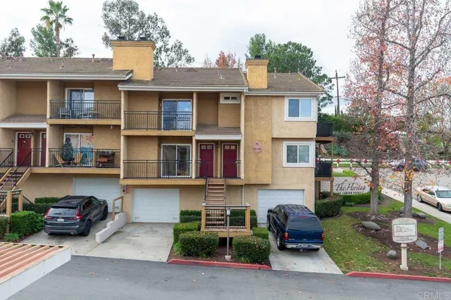 a view of a building with garden and plants