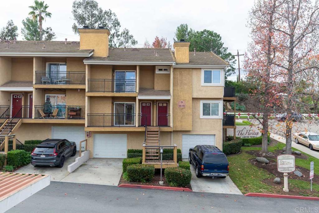 505 San Pasqual Valley Road, Unit 186 Escondido, CA 92025 - Photo 26 of 28 a front view of a house with parking space