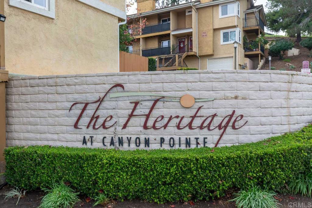 505 San Pasqual Valley Road, Unit 186 Escondido, CA 92025 - Photo 27 of 28 a view of a building with garden and plants