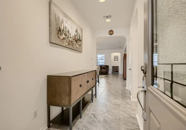 a view of hallway with stairs