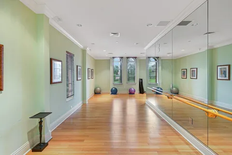 a large hall with wooden floor