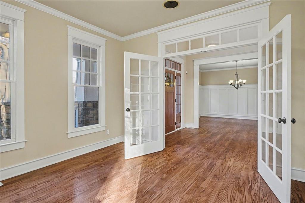 3105 Brick Lane Decatur, GA 30033 - Photo 11 of 72 an empty room with wooden floor and windows