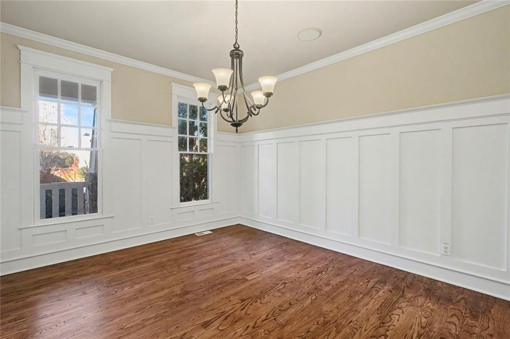 3105 Brick Lane Decatur, GA 30033 - Photo 24 of 72 a view of empty room with wooden floor and fan