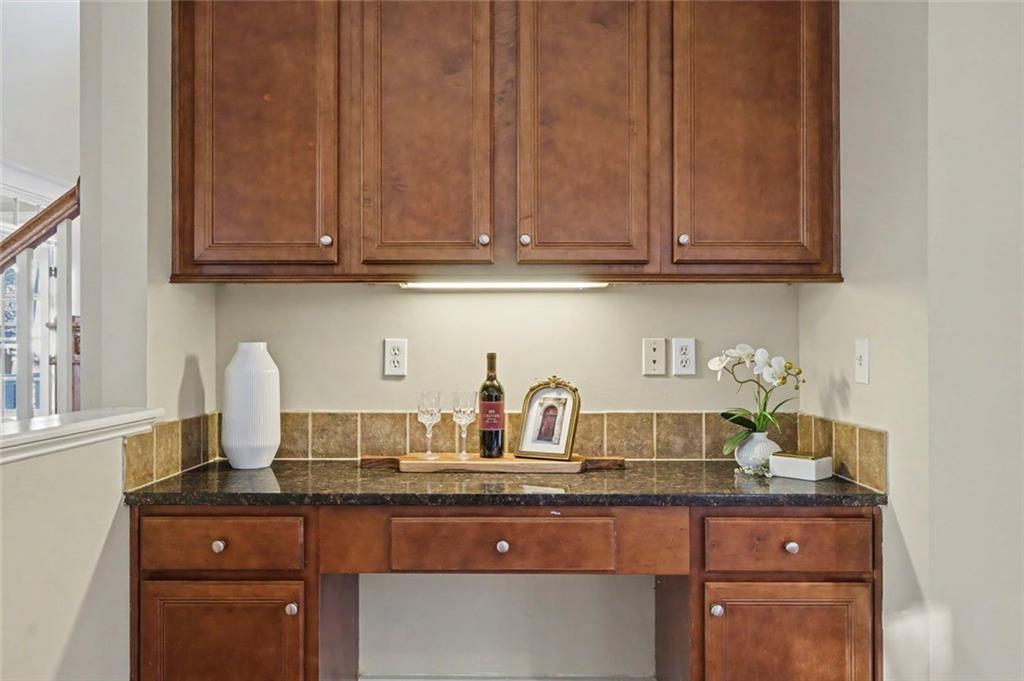 3105 Brick Lane Decatur, GA 30033 - Photo 36 of 72 a kitchen with granite countertop stainless steel appliances sink and cabinets